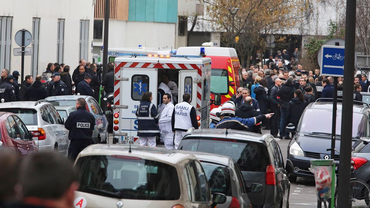 Charlie Hebdo shooting: 1 of 3 suspects surrenders to police | abc7.