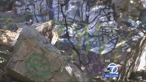 Graffiti is shown in Cucamonga Canyon. There is a growing effort to restore the canyons natural beauty.