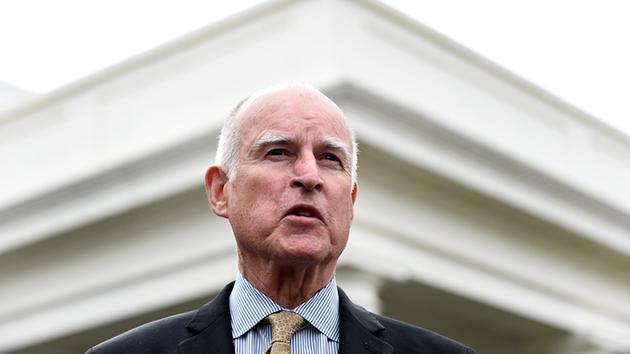 California Gov. Jerry Brown speaks to reporters outside the White House in Washington, Friday, March 13, 2015.