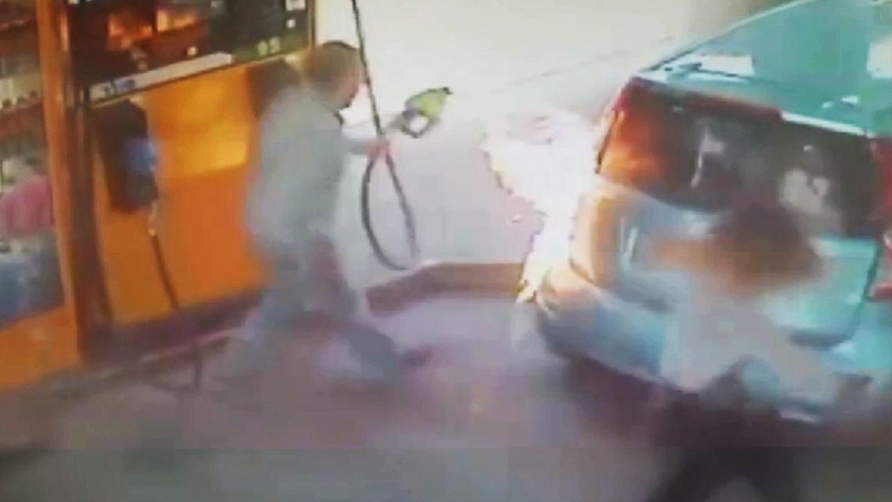 VIDEO Woman lights pump on fire at gas station