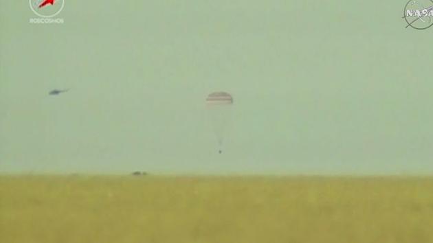 The Soyuz spacecraft carrying NASA astronaut Terry Virts, European astronaut Samantha Cristoforetti and Russian cosmonaut Anton Shkaplerov is seen just a few seconds from landing in the steppe of Kazakhstan. 