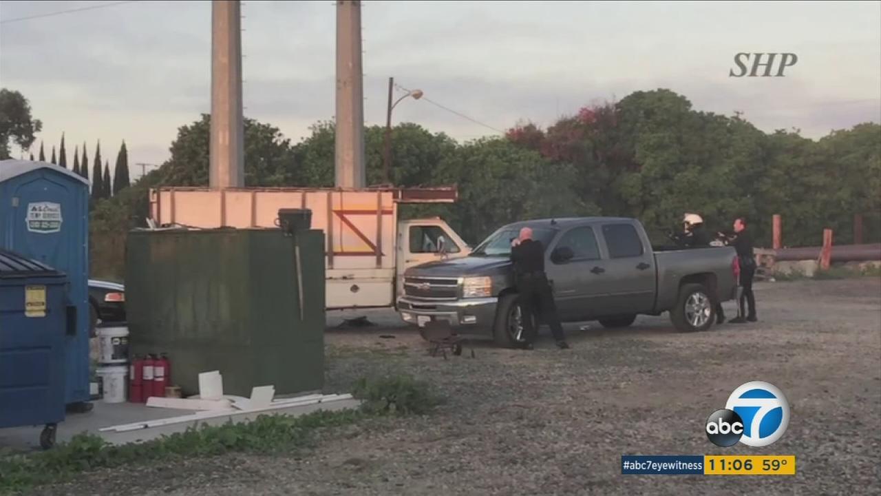 VIDEO: Police shoot at suspect who chased man with chainsaw, truck at Torrance Edison facility - KABC-TV