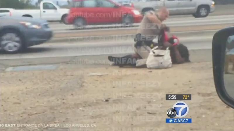 Driver records CHP officer punching woman