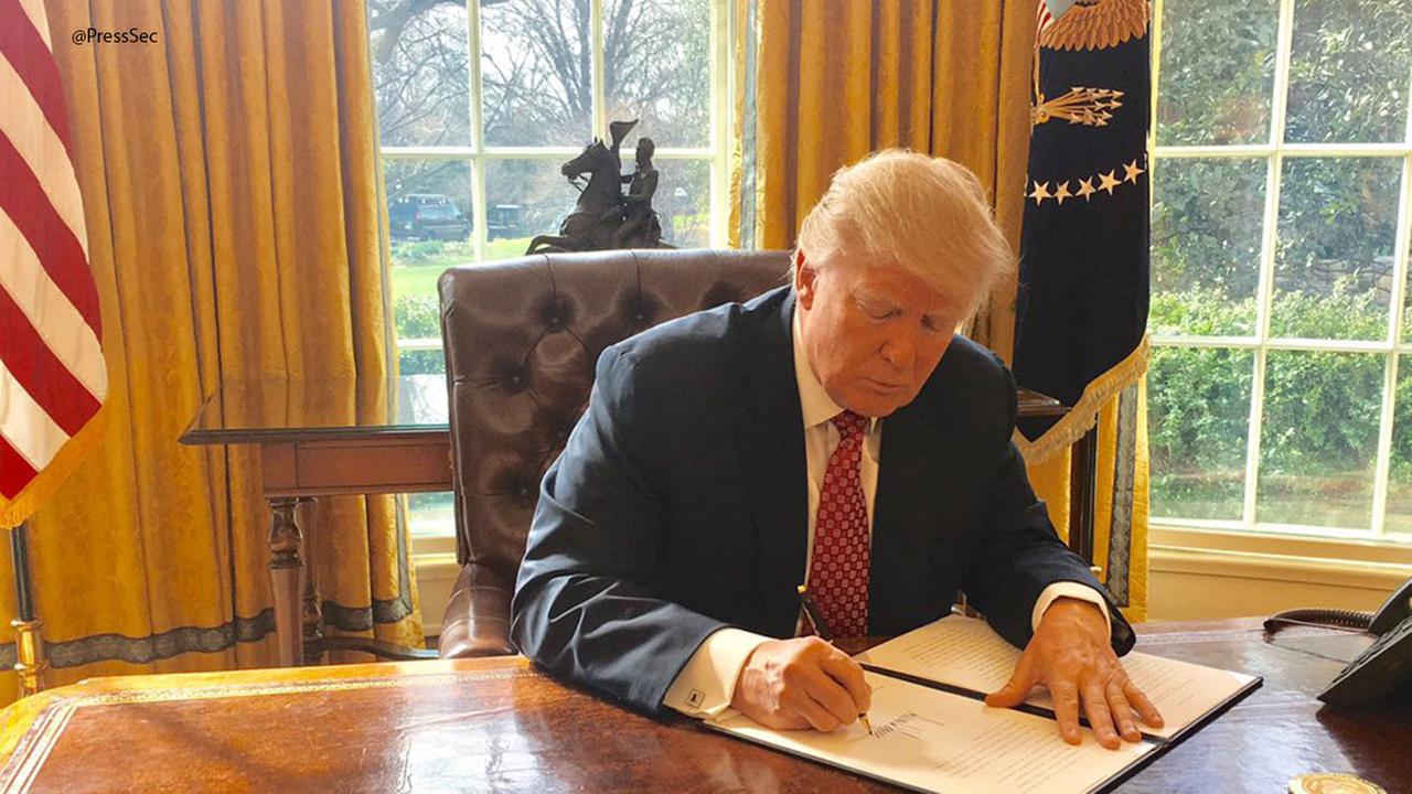 President Trump signs new travel ban targeting those seeking new visas