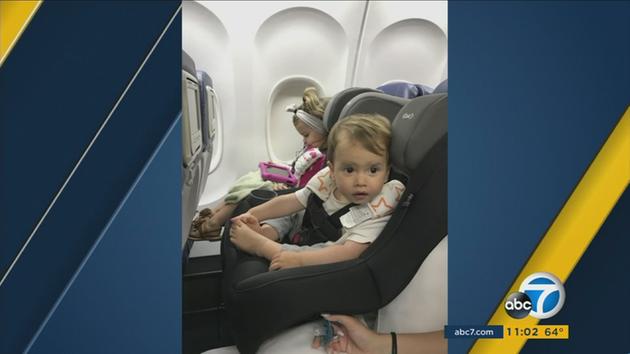 Brian Schear and his wife were ordered to yield the purchased seat of their infant son Grayson and hold him on their lap.