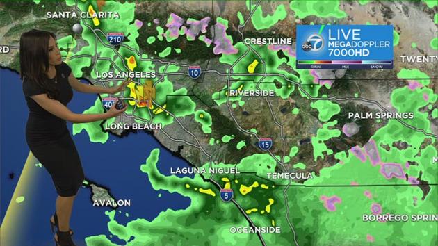 An unusual winter-like storm is hitting Southern California on Sunday, bringing hail, snow, lightning and rain.