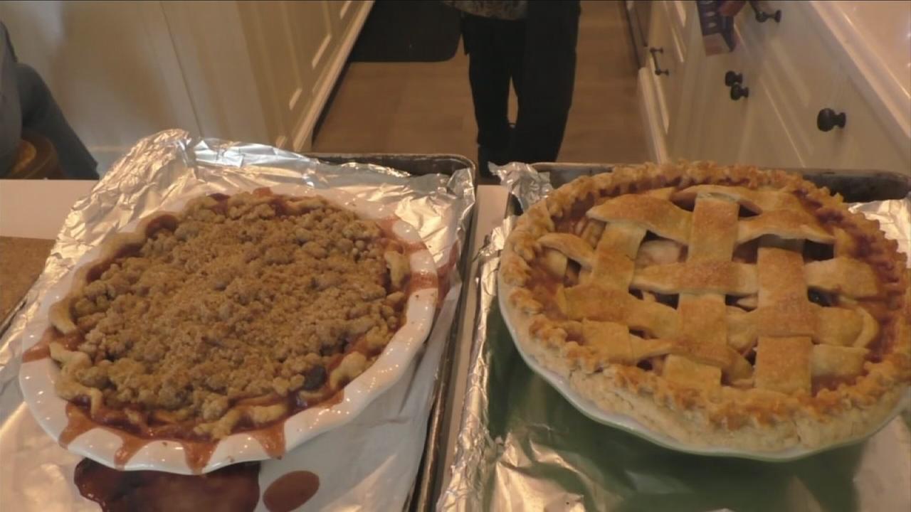Cooking instructor Pamela Salzman displays finished pies made during a class.