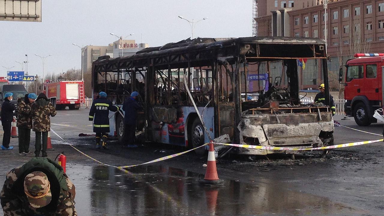 Bus catches fire in north China, 14 dead, over 30 injured