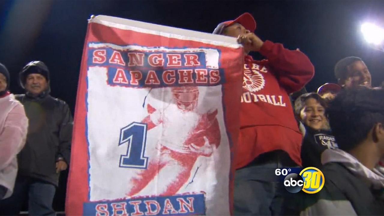 Crowds pack Tom Flores Stadium in Sanger for playoff football game