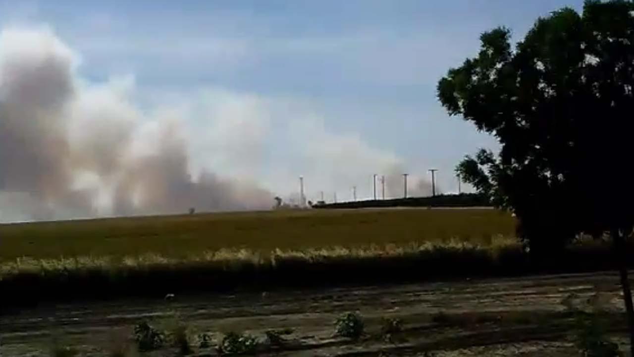 Grass fire in Fresno County fueled by winds under control