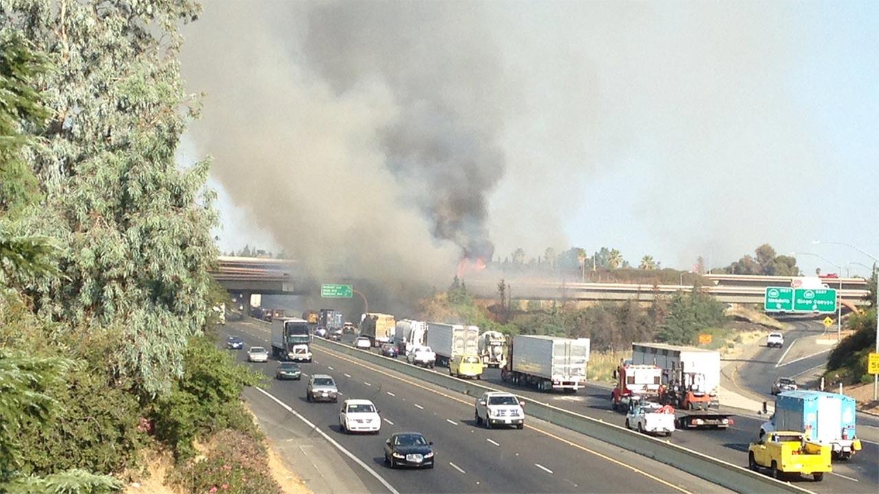Two grass fire slow traffic on Highway 99