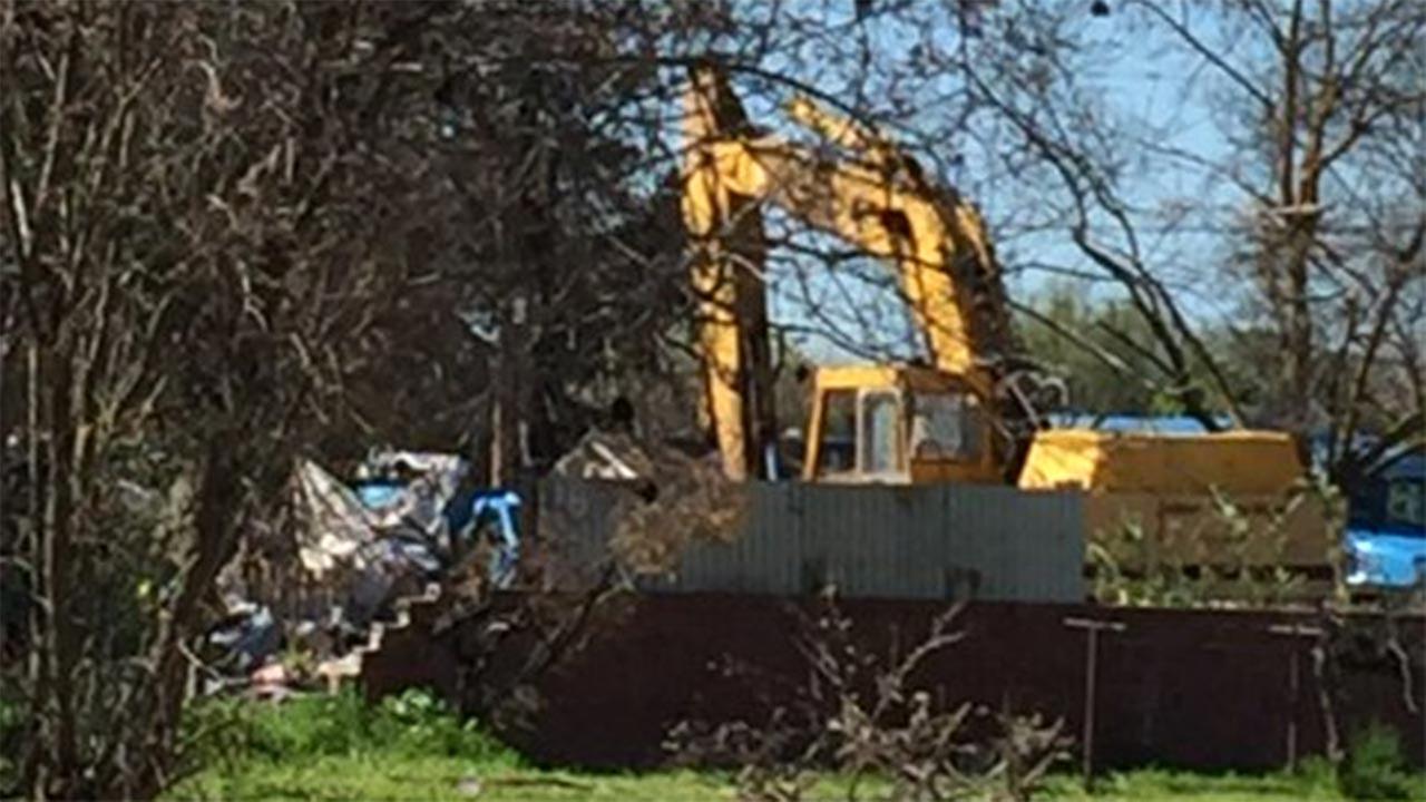 Gas line ruptures while county crews clean up homeless encampment