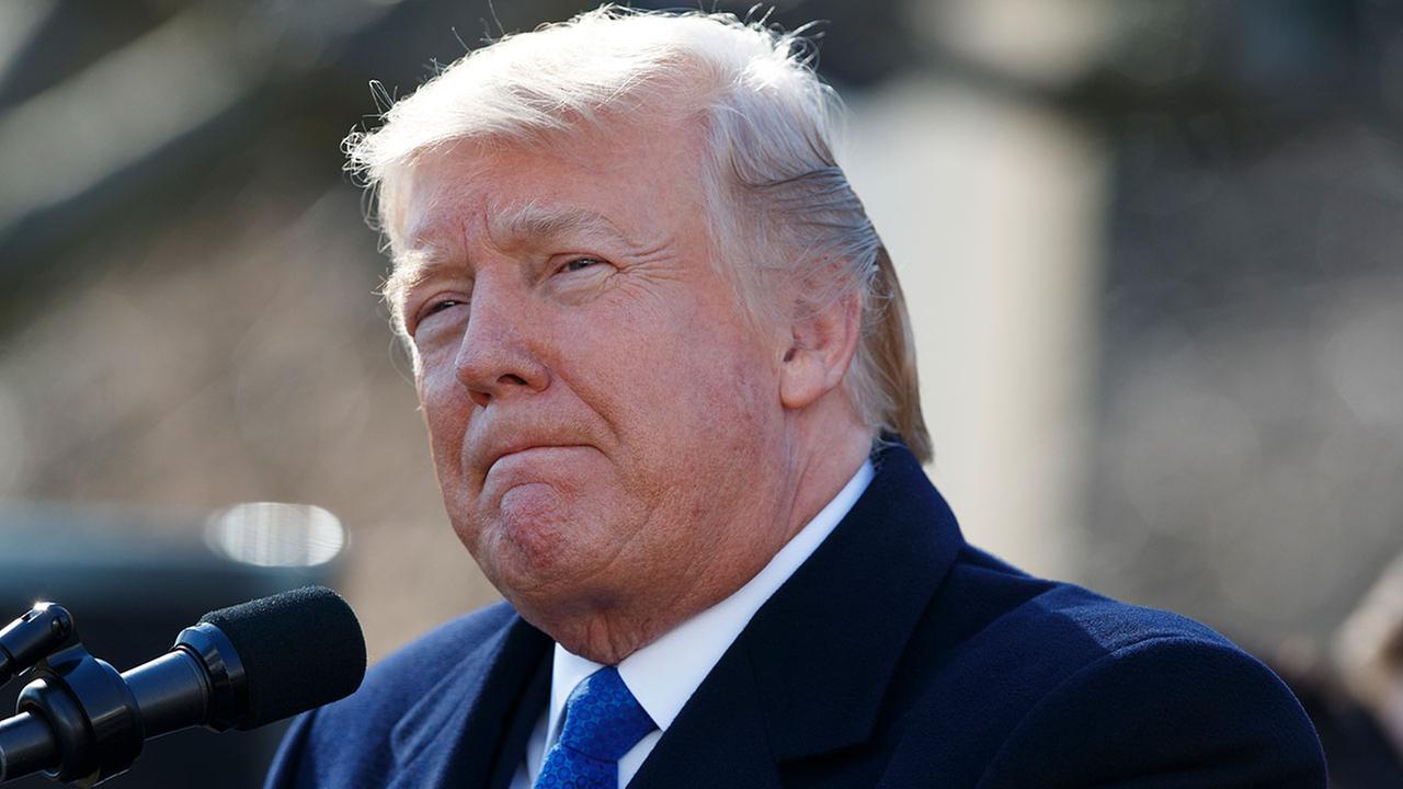FILE- In this Friday, Jan. 19, 2018, file photo, President Donald Trump speaks to the March for Life participants from the Rose Garden of the White House in Washington.