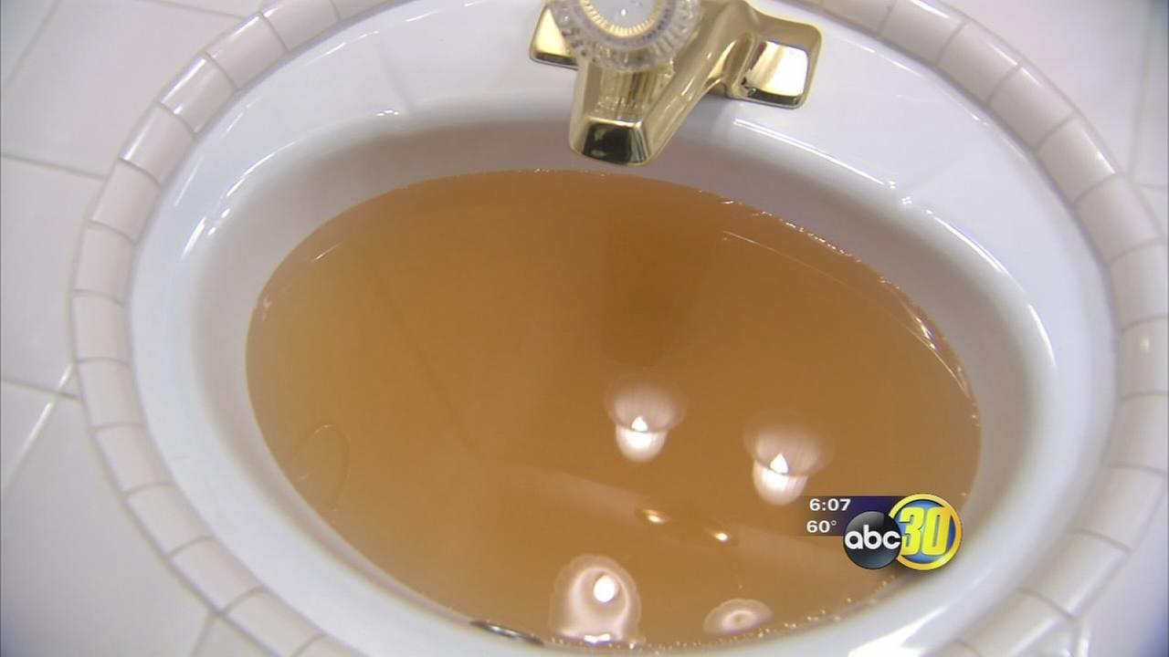 Rust colored water flows from the taps in some north Fresno homes