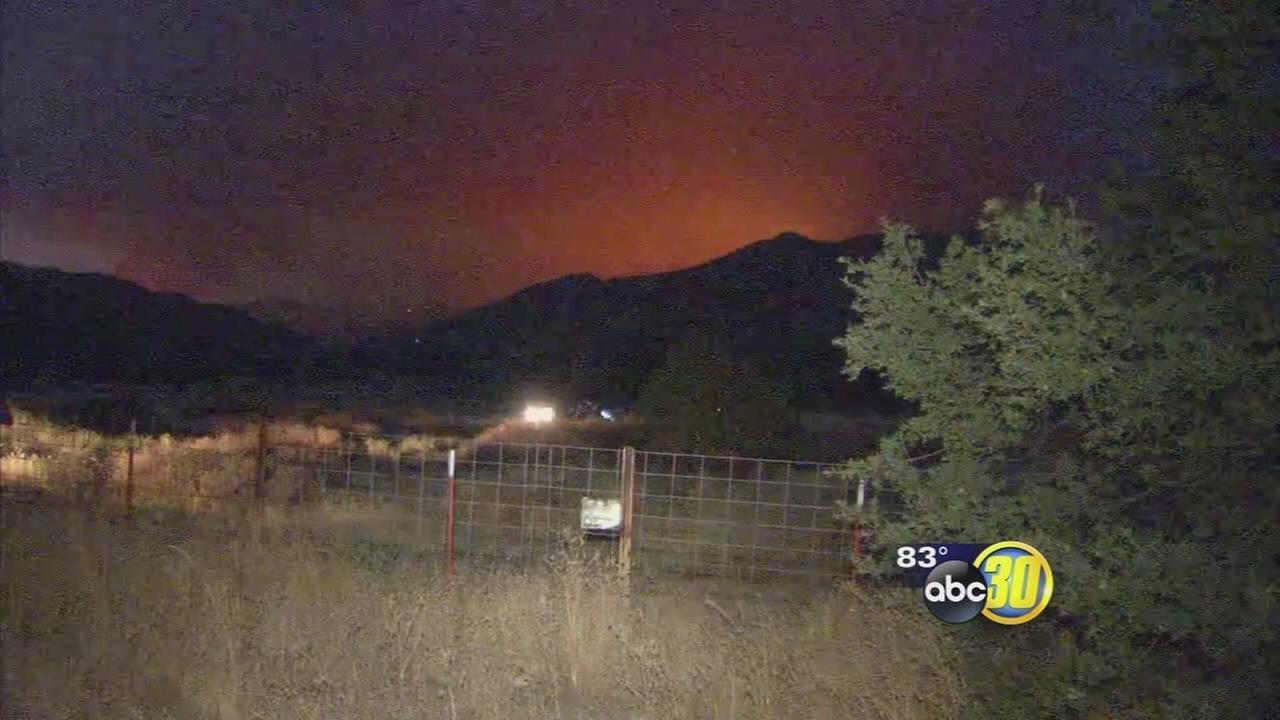 12 homes evacuated as fire west of Coalinga continues to burn