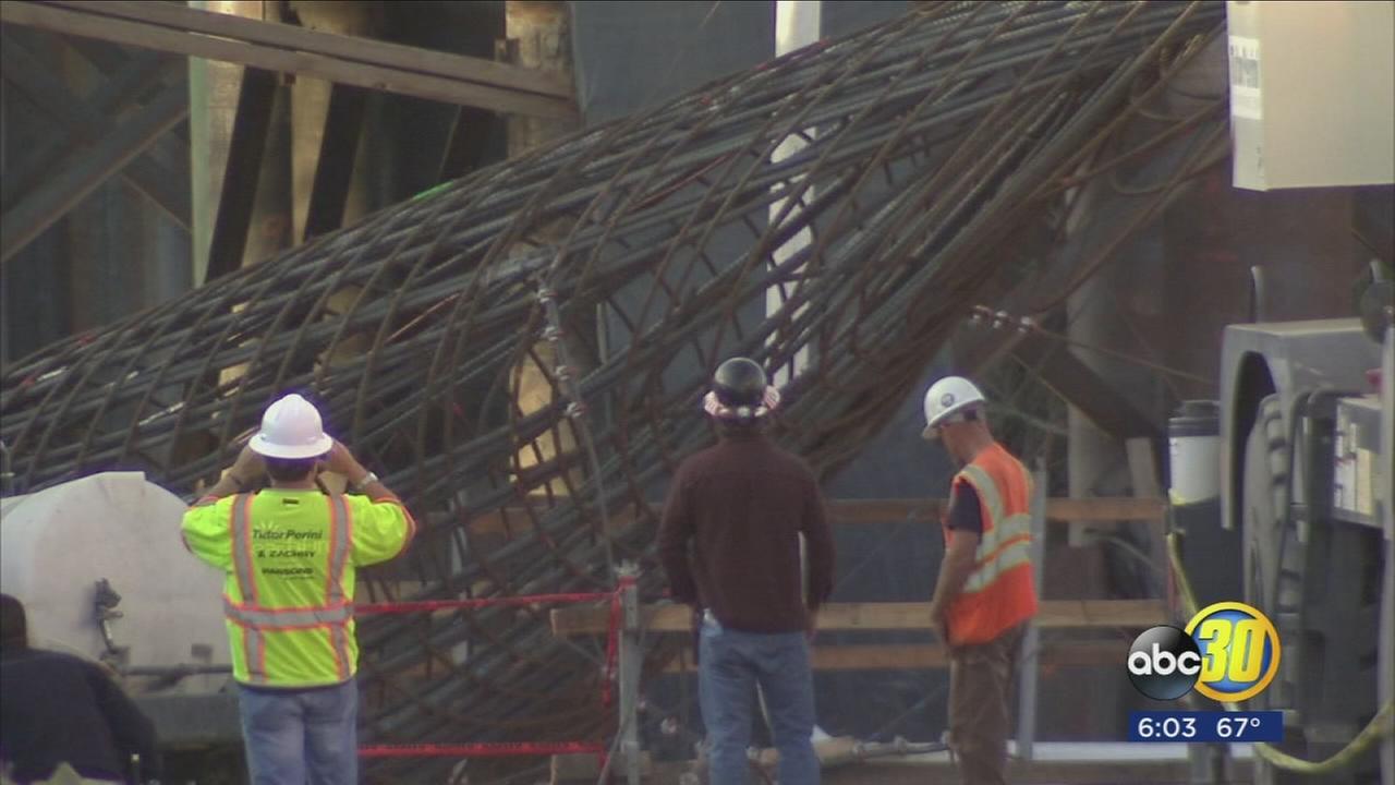 Two people are trapped under collapsed structure in Northwest Fresno