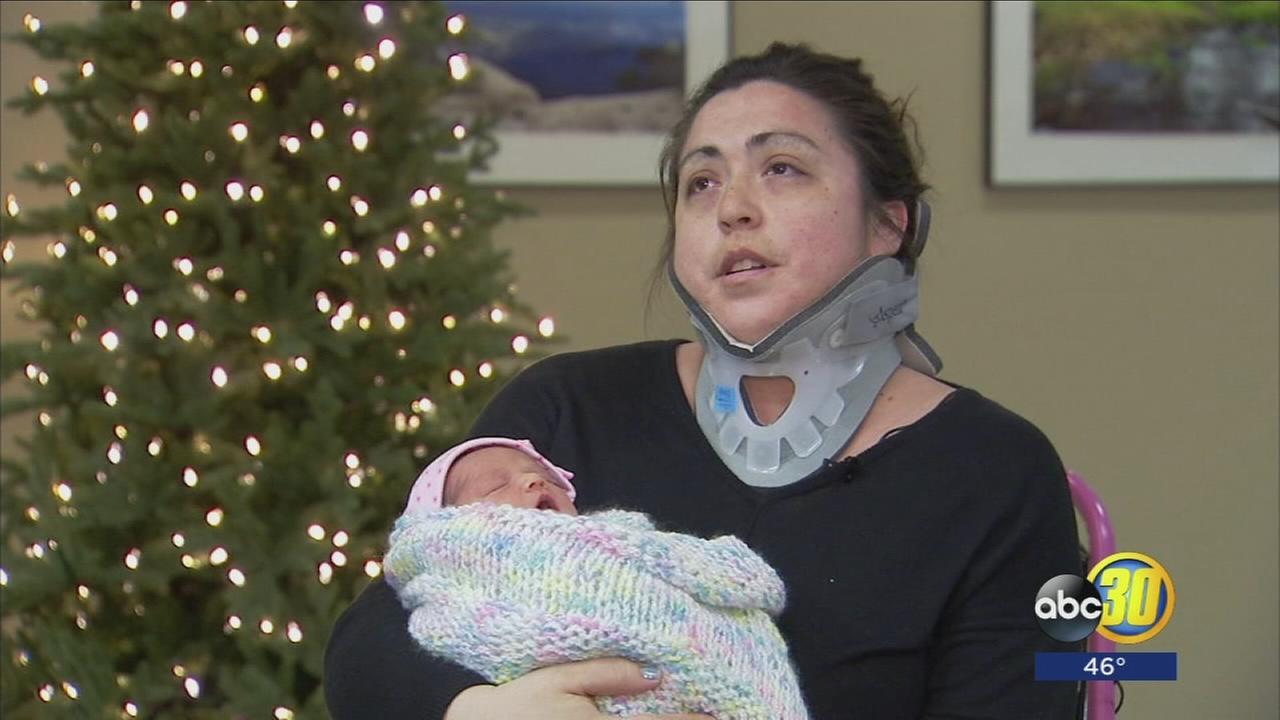 Girlfriend of man killed in Christmas crash out of hospital, says only consolation is healthy baby