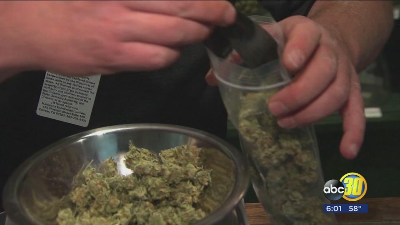 Thousands line-up to take part in legal recreational sale of marijuana