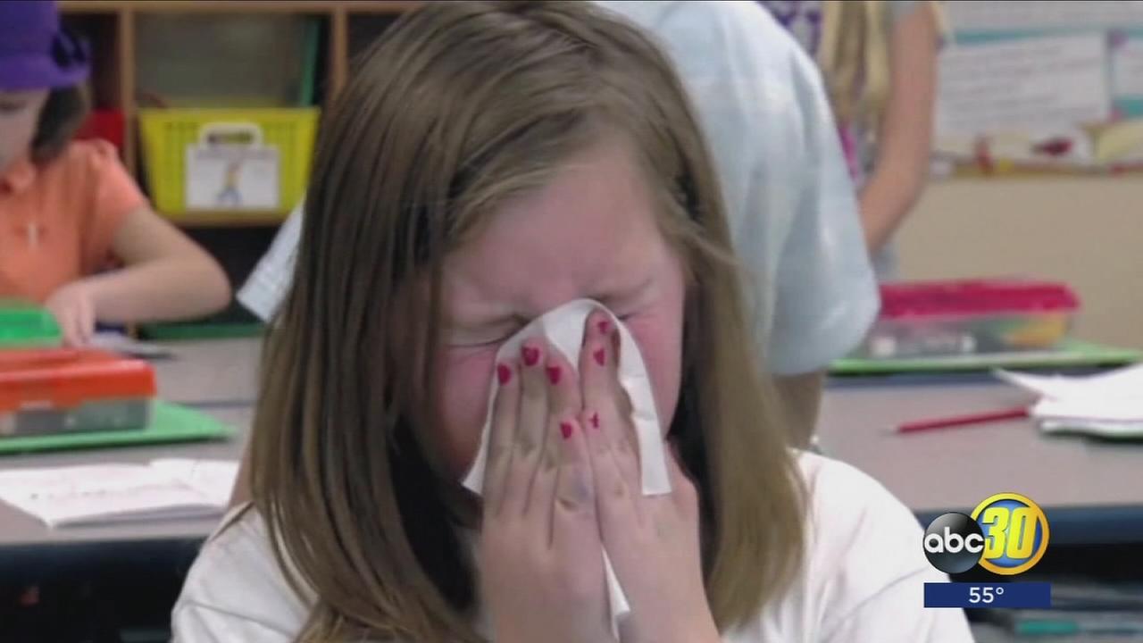 An uncommon outbreak of influenza A and B has local hospitals flooding with patients
