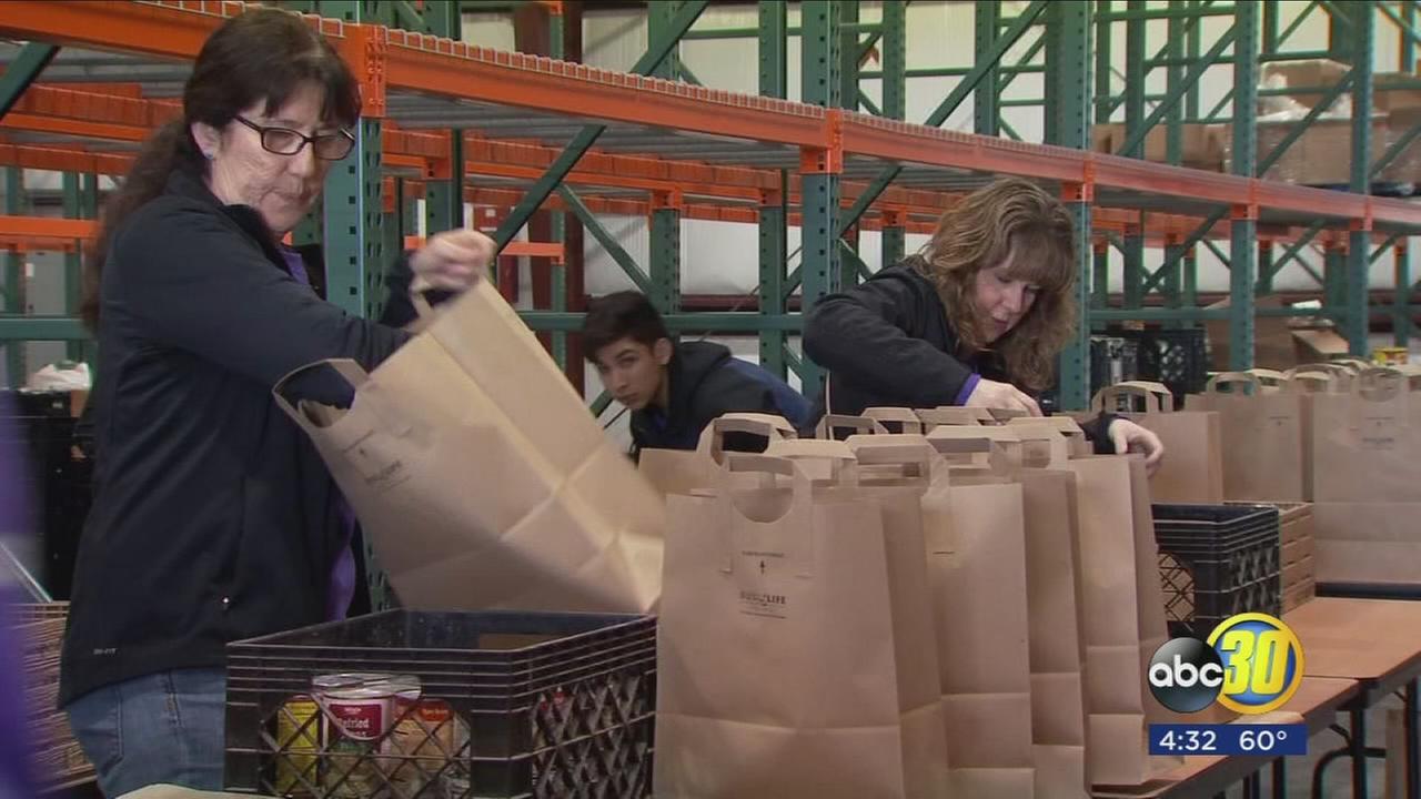 Dozens spend Martin Luther King Day serving homeless at Poverello House