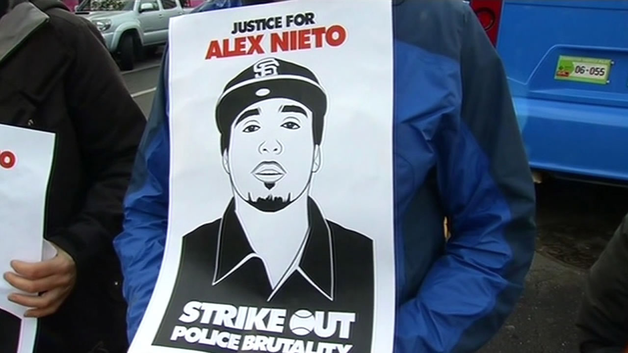 <div class='meta'><div class='origin-logo' data-origin='KGO'></div><span class='caption-text' data-credit=''>Demonstrators hold posters of Alex Nieto on Monday, March 23, 2015.(KGO-TV)</span></div>