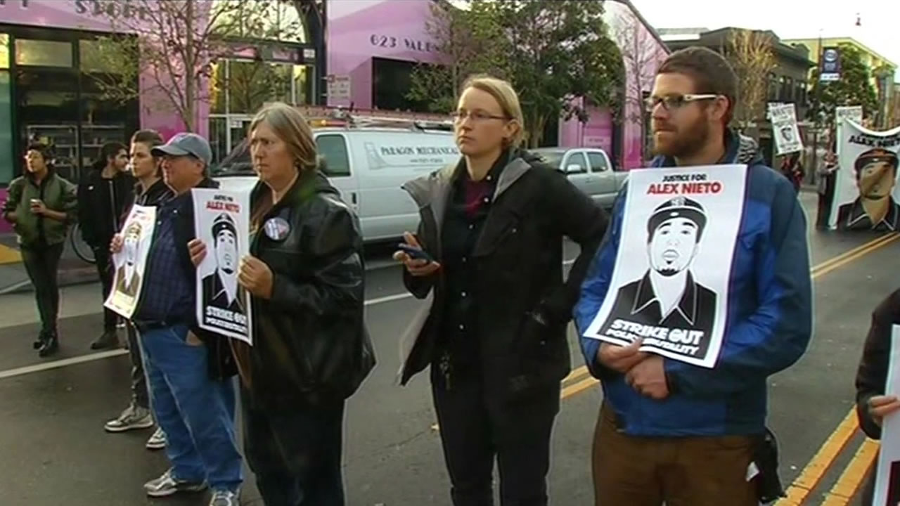 <div class='meta'><div class='origin-logo' data-origin='KGO'></div><span class='caption-text' data-credit=''>The group Stop Police Impunity mark the one-year anniversary of the fatal shooting of Alex Nieto, Monday, March 23, 2105. (KGO-TV)</span></div>