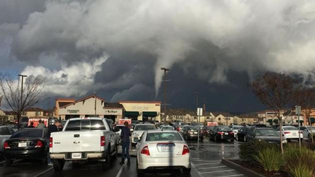 A possible funnel cloud was spotted at a Raleys parking lot in Folsom, Calif. Dec. 24, 2015. 
