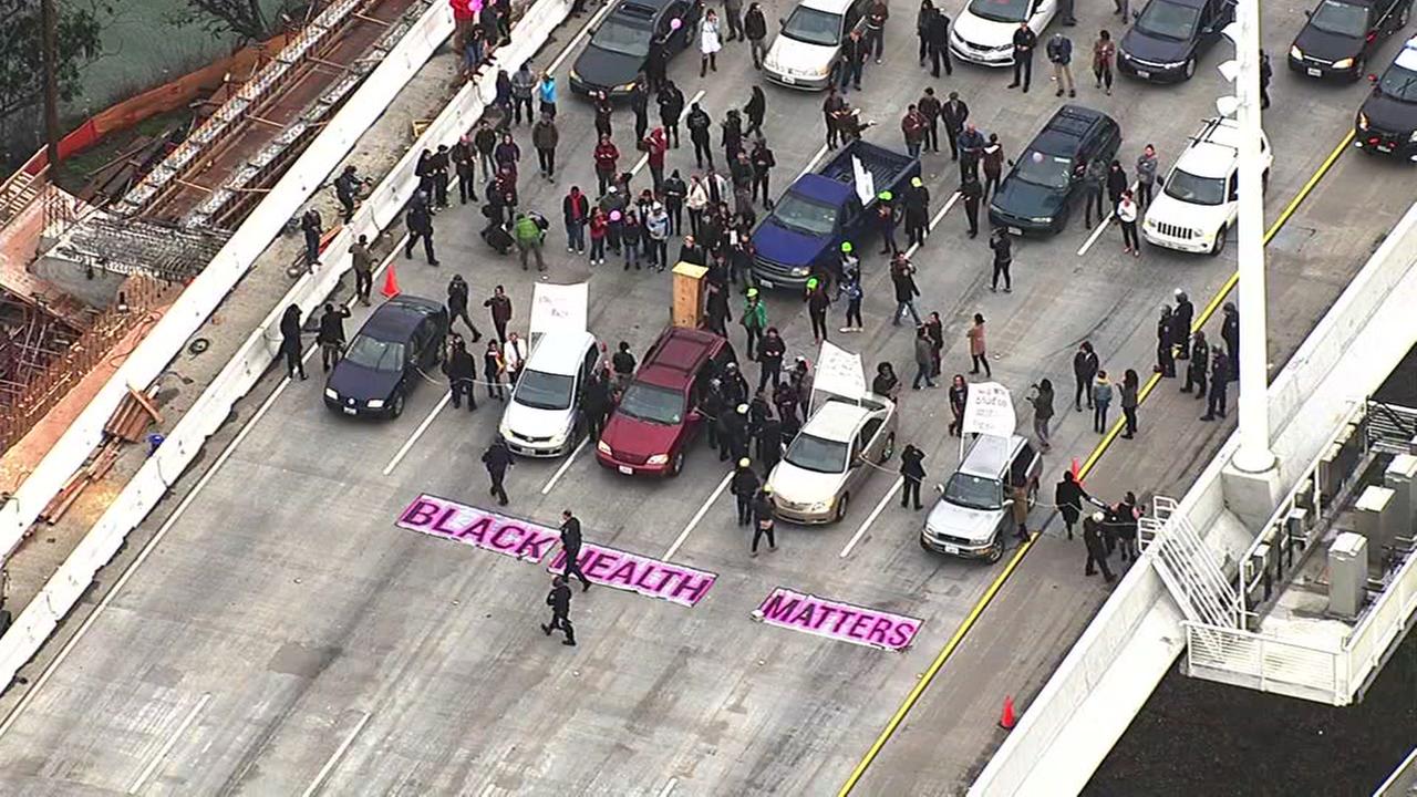 PHOTOS Chained protesters block westbound traffic on Bay Bridge
