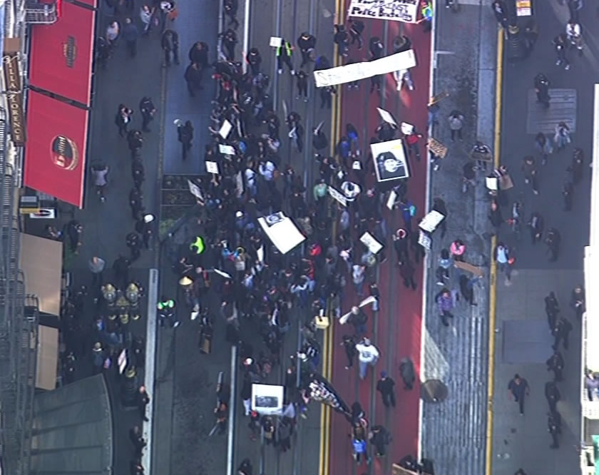 <div class='meta'><div class='origin-logo' data-origin='none'></div><span class='caption-text' data-credit='KGO-TV'>Demonstrators protesting the fatal shooting death of Mario Woods by multiple officers marched through downtown San Francisco on Friday, December 11, 2015.</span></div>