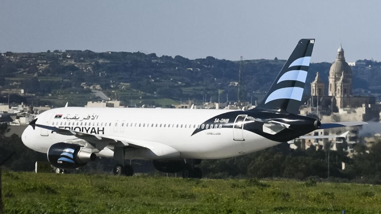 Hijackers of Libyan plane surrender, Malta's prime minister says
