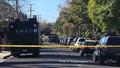 A SWAT vehicle is seen during a search for an armed man in Menlo Park, Calif. on Sunday, Feb. 25, 2018.