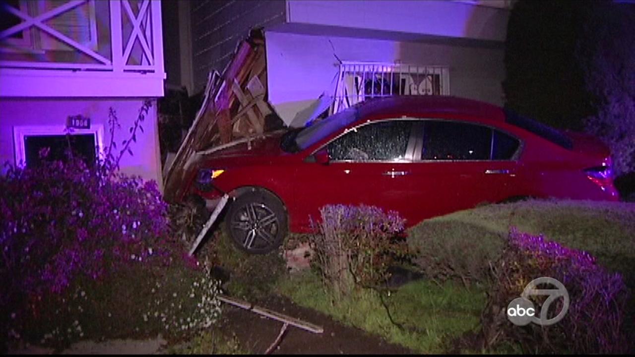 San Francisco police searching for hit and run driver after car crashes into house