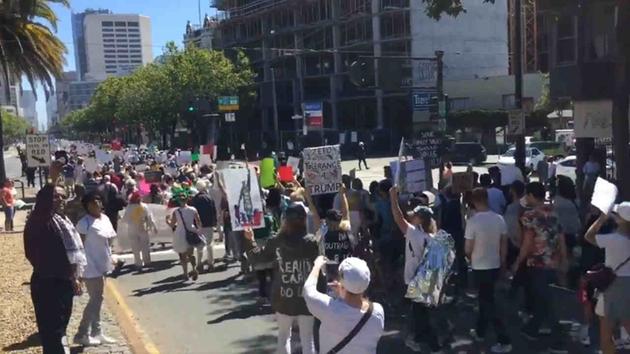 <div class='meta'><div class='origin-logo' data-origin='none'></div><span class='caption-text' data-credit='KGO-TV'>Thousands of protesters are seen marching down Market Street in San Francisco on Saturday, June 30, 2018.</span></div>