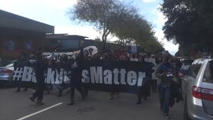 Protesters march from UC Berkeley to Oakland on Saturday, Dec. 13, 2014.
