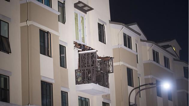 A fourth floor balcony rests on the balcony below after collapsing at the Library Gardens apartment complex in Berkeley, Calif., early June 16, 2015. <span class=meta>AP Photo/Noah Berger</span>