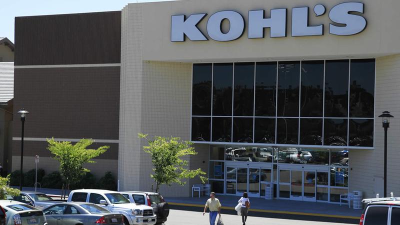 In this Aug. 8, 2011 photo, shoppers enter and exit the Kohls store in San Rafael, Calif. (AP Photo/Eric Risberg)