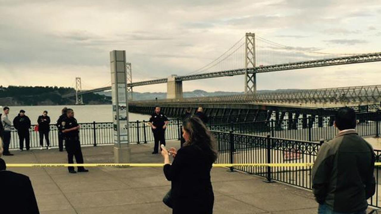 San Francisco police block off the scene of a shooting at Pier 41 near ...
