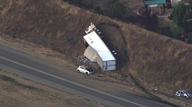 A big rig overturned after hitting several vehicles on Highway 84 in Livermore on Wednesday, July 15, 2015.