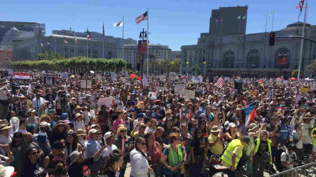 <div class='meta'><div class='origin-logo' data-origin='none'></div><span class='caption-text' data-credit='KGO-TV'>A crowd of protesters is seen at Civic Center Plaza in San Francisco on Saturday, June 30, 2018.</span></div>