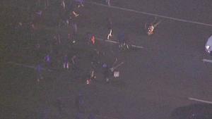 Protesters stage a die-in on Highway 24