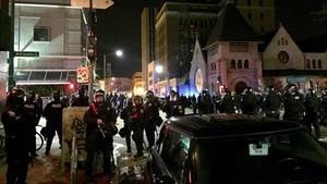 Oakland police surrounded demonstrators at Franklin and 17th streets during Saturday nights protests. 