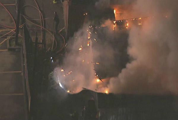 <div class='meta'><div class='origin-logo' data-origin='none'></div><span class='caption-text' data-credit='KTRK Photo'>Firefighters worked to put out flames that broke out at an Islamic institute in southeast Houston</span></div>