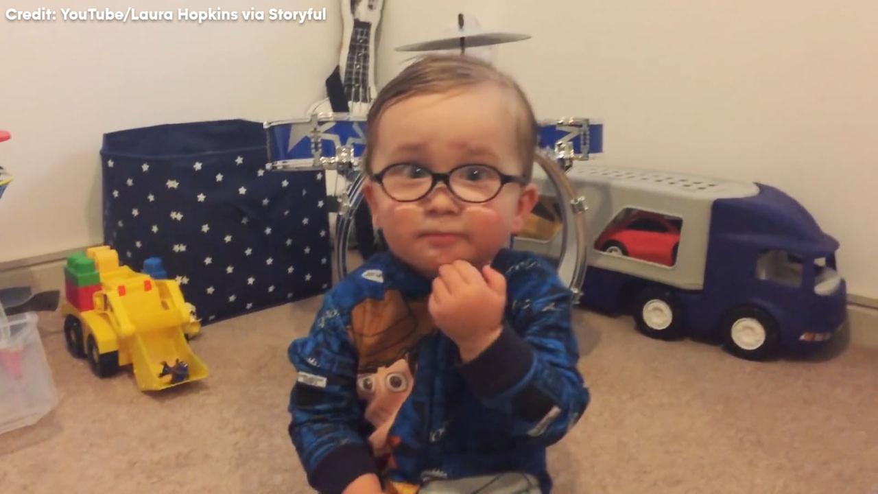 Adorable toddler knows his dinosaurs very well