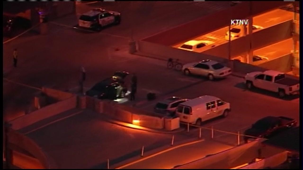 2 wounded, man held after Las Vegas airport lot shooting