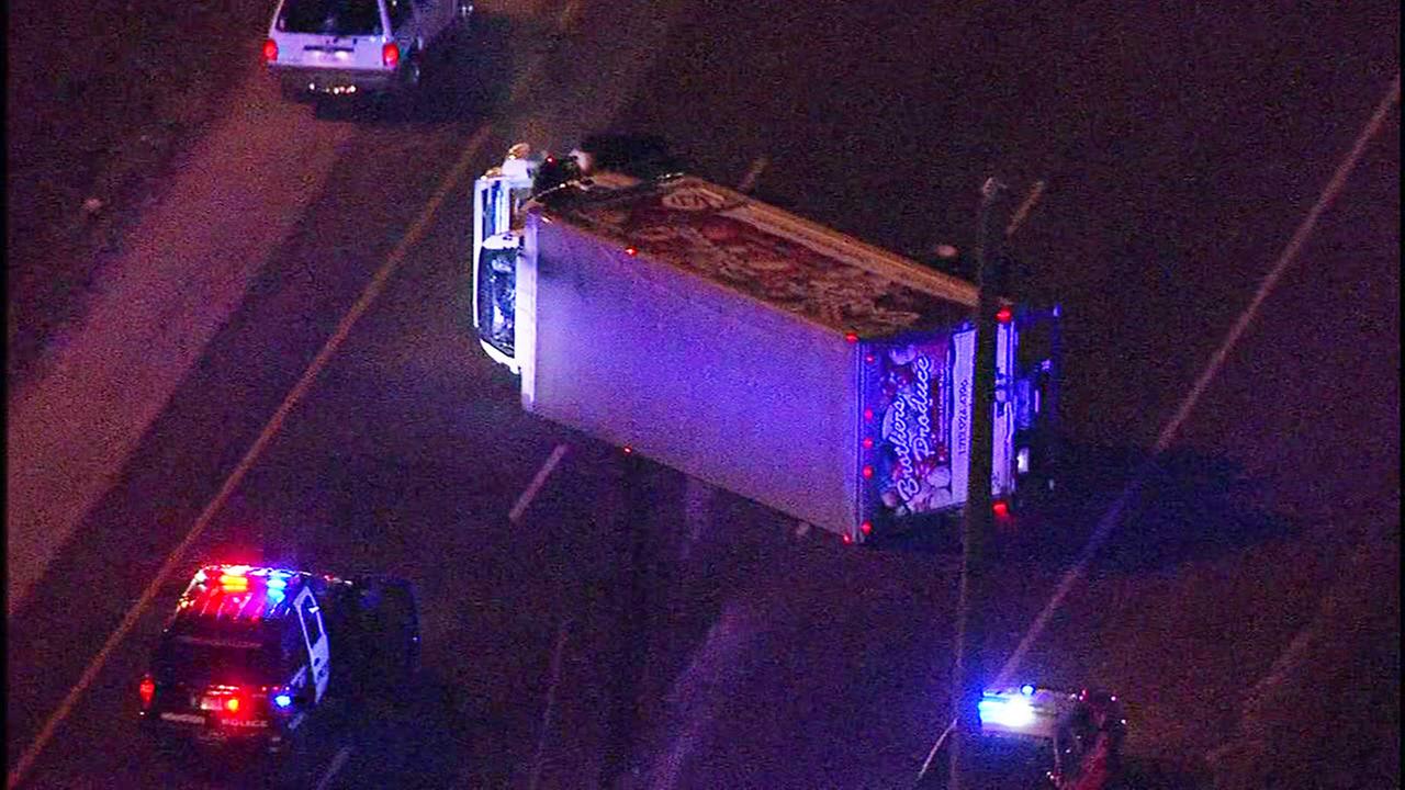 Flipped box truck blocking SH-288 outbound at Reed Road 