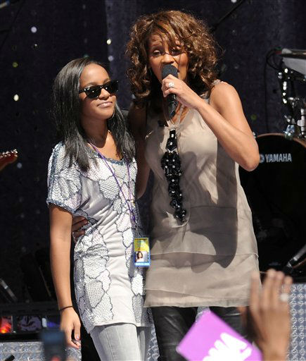 Whitney Houston and Bobbi Kristina Brown in 2009 at the GMA summer concert series. Photo/AP photo 