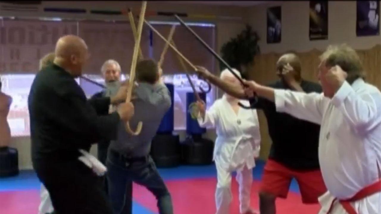 Canefu teaches senior citizens self defense moves with crutches