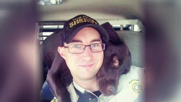 K9 cop can't keep from hugging his partner