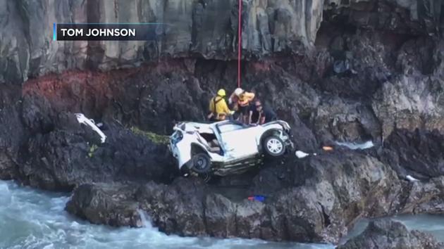 Twin charged after cliff death