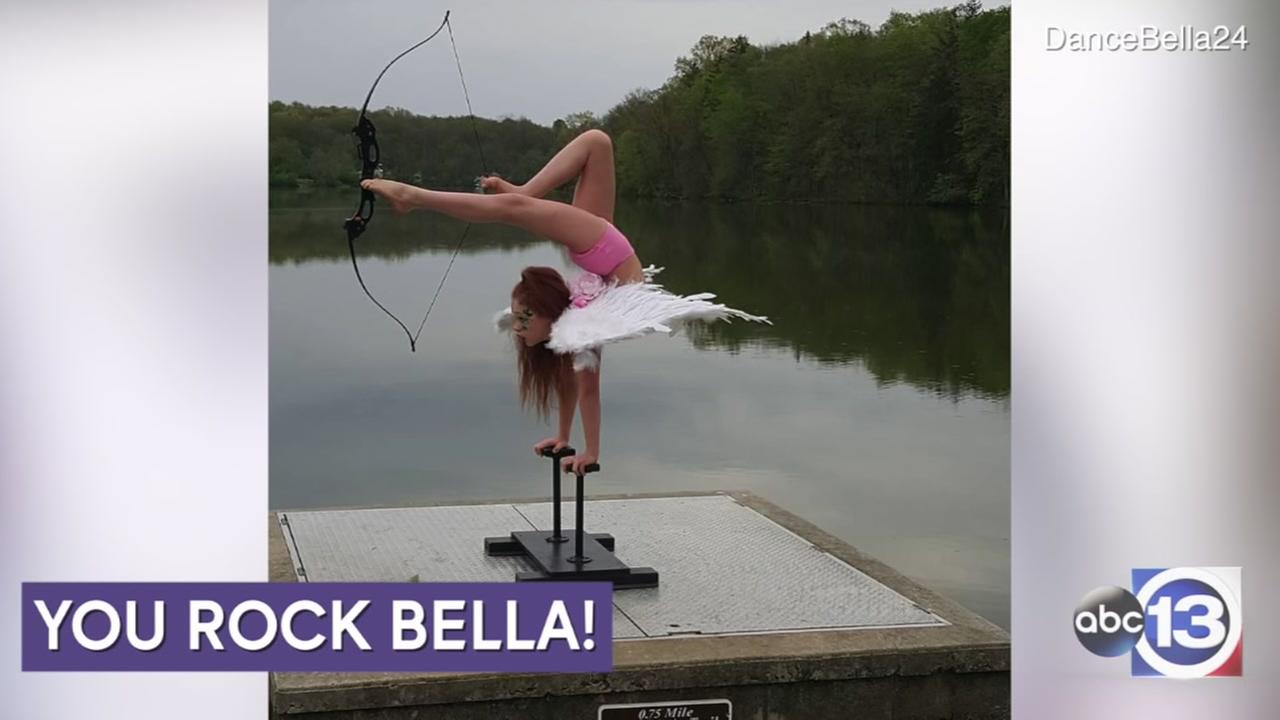 Young Contortionist Shoots A Bow And Arrow With Her Feet 0835